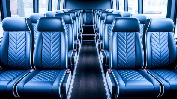 des moines 28 passenger minibus rental